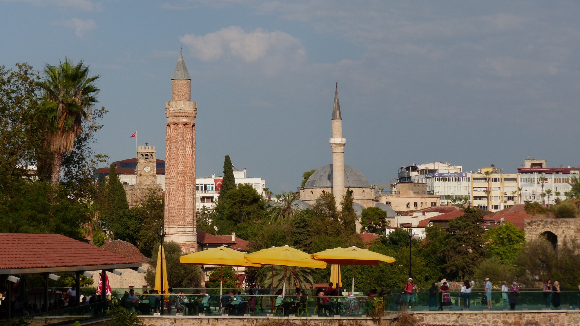 The closer minaret is the Yivli Minaret Mosque also called as the fluted minaret
